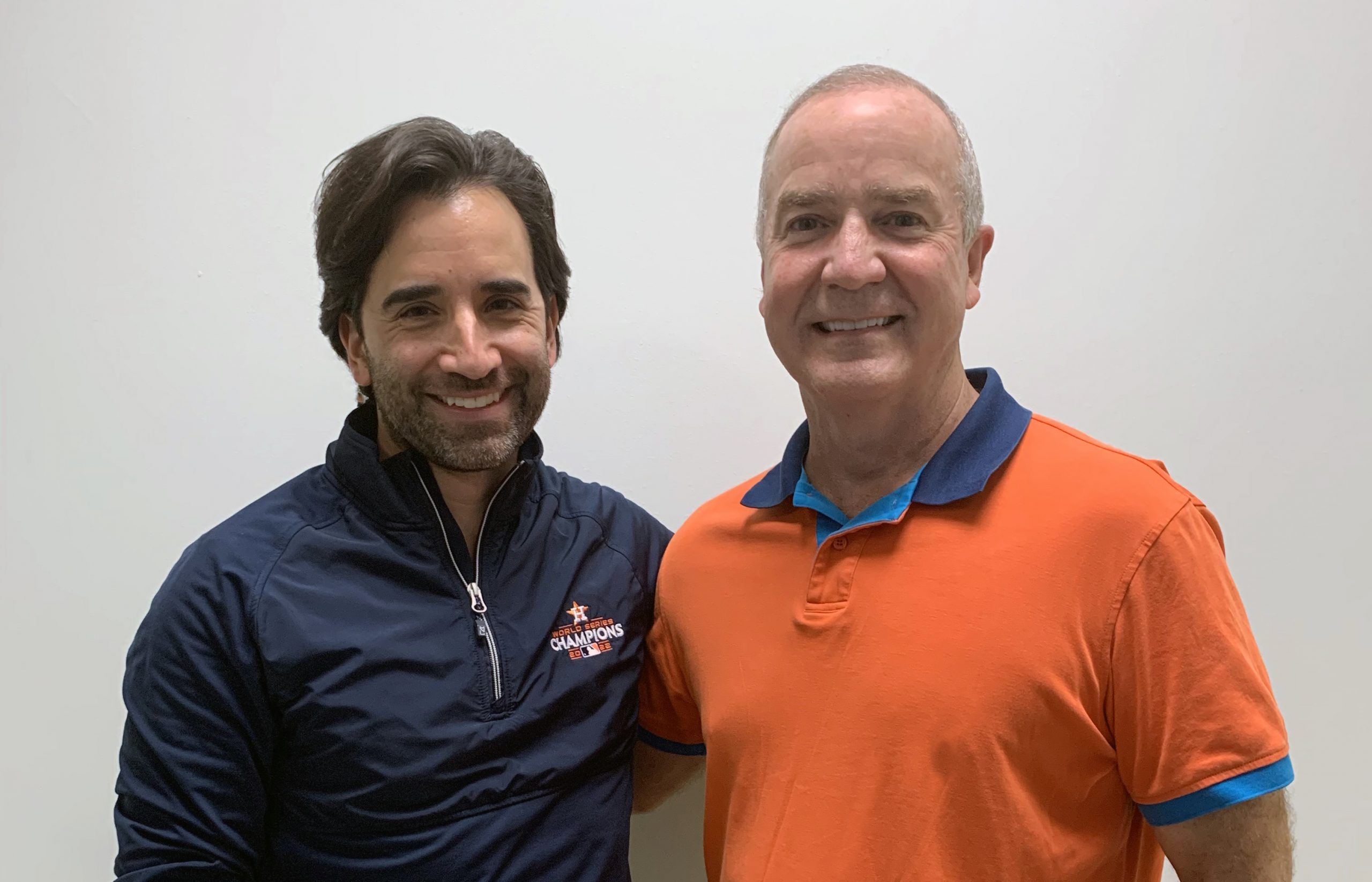 Physical Therapist John Fernandez standing beside Tom O'Driscoll